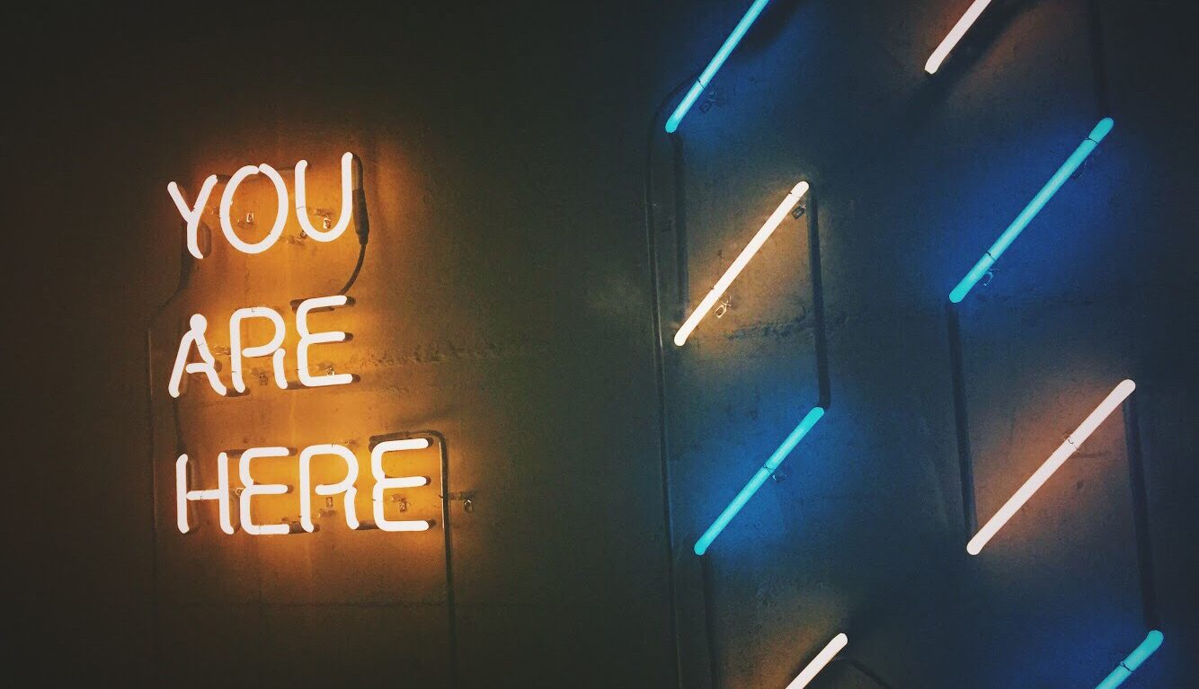 neon sign you are here